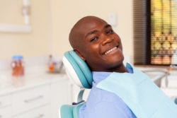 Patient receiving dental implant sedation consultation in CA